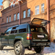 Illustration for article titled The Jeep Grand Cherokee You Never Knew: Inside Russia’s Wild 90s and the SUV That Ruled Its Roads